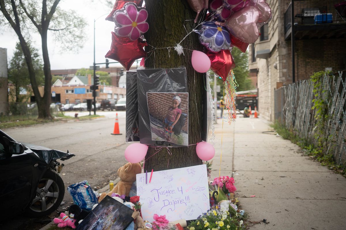 A memorial for 8-year-old Dajore Wilson was erected at the corner of 47th Street and Union Avenue, where the child was fatally shot Monday evening.