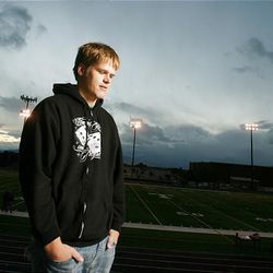 Bryant Atkinson stands on Timpview football field, where he was the state's most sought-after player after high school in 2001. He was recruited by BYU.