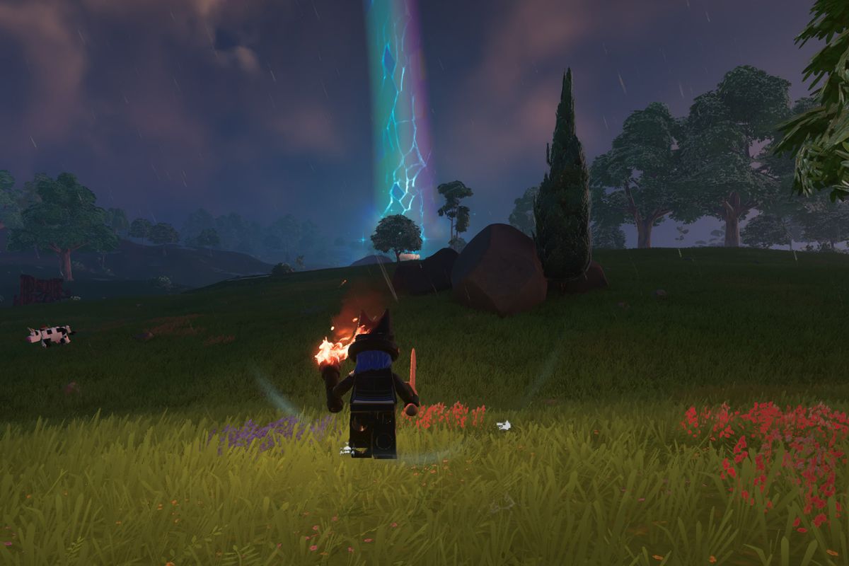 A Lego Fortnite character approaches a rainbow laser coming out of the skin in the dark