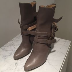 Beige strappy boots, $150