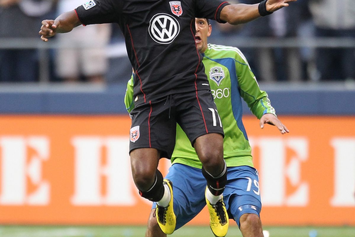 SEATTLE - JUNE 10:  Luciano Emilio #11 of D.C. United battles Leonardo Gonzalez #19 of the Seattle Sounders FC on June 10, 2010 at Qwest Field in Seattle, Washington. (Photo by Otto Greule Jr/Getty Images)