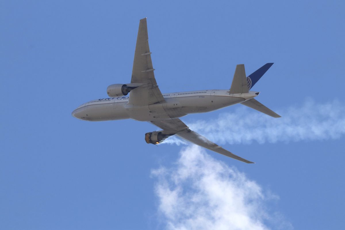 This Saturday, Feb. 20, 2021 photo provided by Hayden Smith shows United Airlines Flight 328 approaching Denver International Airport, after experiencing “a right-engine failure” shortly after takeoff from Denver.