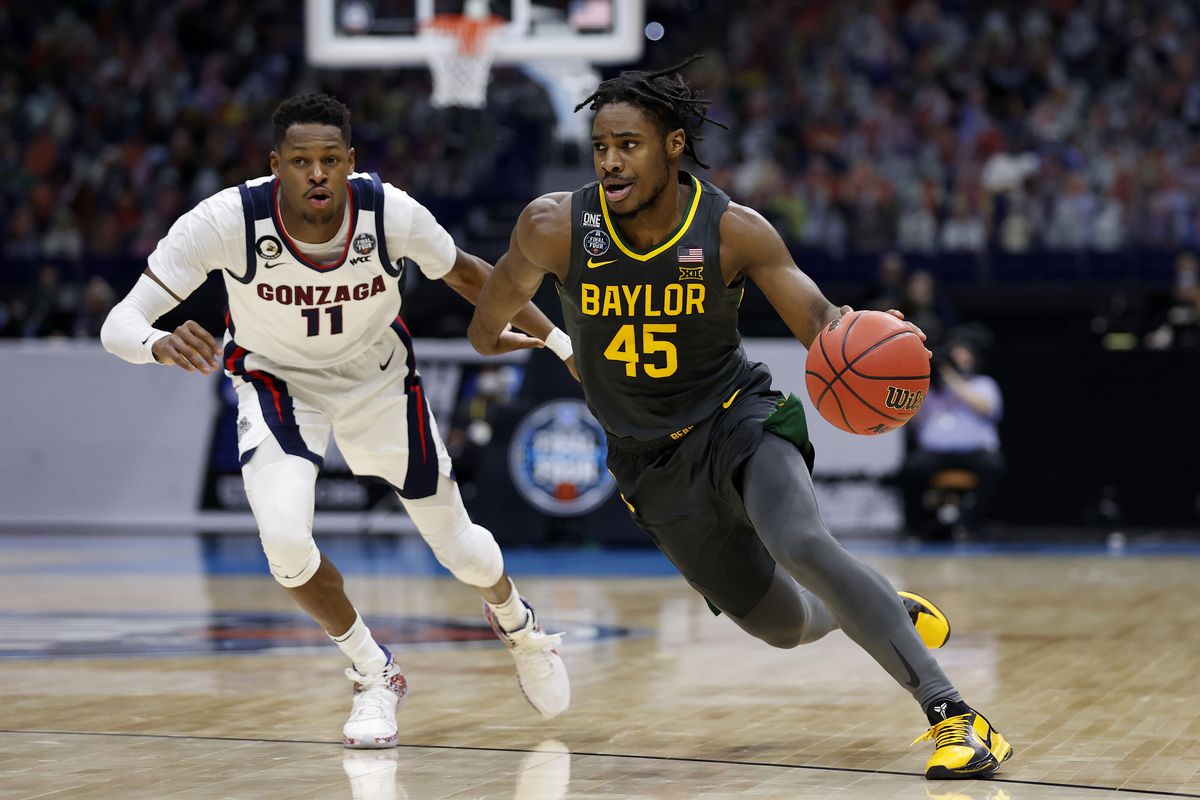 Davion Mitchell of the Baylor Bears drives to the basket as Joel Ayayi of the Gonzaga Bulldogs defends in the National Championship game of the 2021 NCAA Men’s Basketball Tournament at Lucas Oil Stadium on April 05, 2021 in Indianapolis, Indiana.