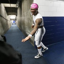 Brigham Young Cougars running back Jamaal Williams (21) has some fun with an usher prior to the Poinsettia Bowl in San Diego on Wednesday, Dec. 21, 2016.