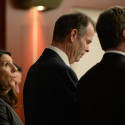 Former Utah Attorney General John Swallow listens, alongside his defense team, as the verdict is read during his public corruption trial at the Matheson Courthouse in Salt Lake City on Thursday, March 2, 2017. Swallow found not guilty on all charges.