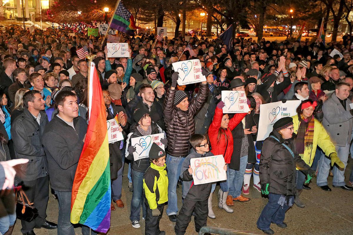 About 1,500 people gather to celebrate marriage equality after a federal judge declined to stay his ruling that legalized same-sex marriage in Utah, at Washington Square just outside of the Salt Lake City and County Building Monday, Dec. 23, 2013, in Salt