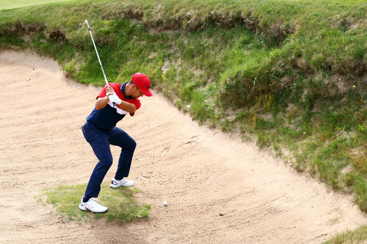 Xander Schauffele of team United States hits from a bunker during Sunday Singles Matches of the 43rd Ryder Cup at Whistling Straits on September 26, 2021 in Kohler, Wisconsin.