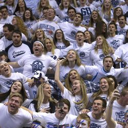 The BYU student section gets pumped up prior to the Cougars' matchup with Pepperdine at the Marriott Center in Provo, Saturday, Jan. 30, 2016. 