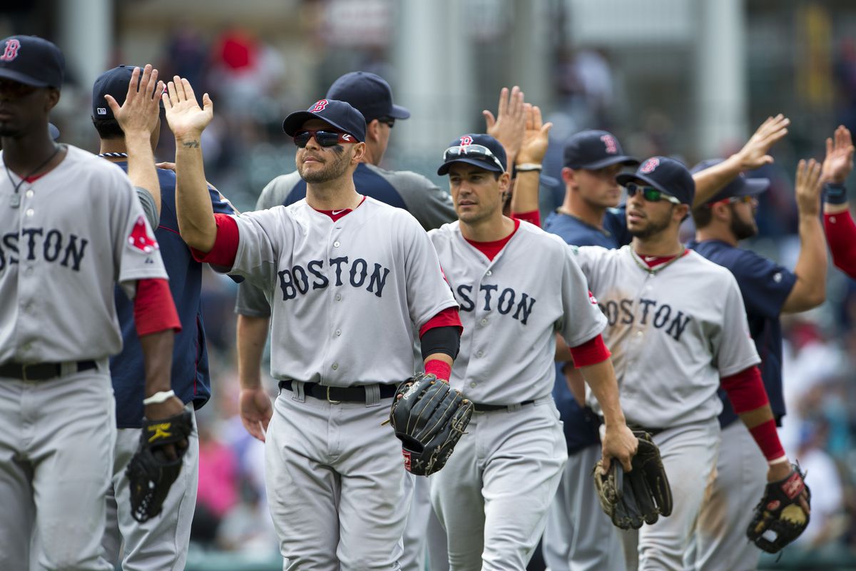 Even when celebrating a win, there are precious few smiles for the Red Sox. (Photo by Jason Miller/Getty Images)