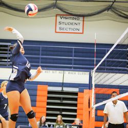 Brighton's Shelby Mims (14) hits the ball back over the net during pre-season volleyball at Brighton High School in Salt Lake City, Utah on Thursday, Aug. 24, 2017. Brighton beat Olympus three sets to none.