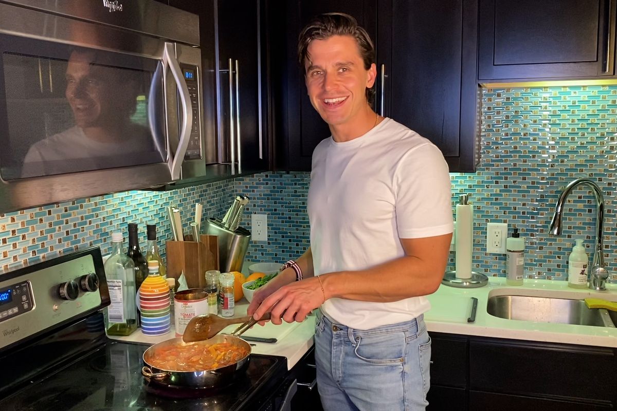 Antoni Porowski cooking in his Austin kitchen in Show Me What You’re Working With