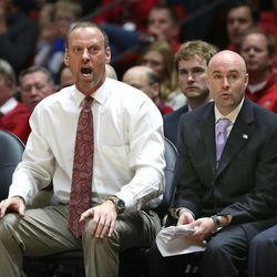 Utah Utes head coach Larry Krystkowiak and assistant coach Andy Hill give direction Sunday, Feb. 15, 2015, in Salt Lake City. Utah beat the Bears, 76-61.
