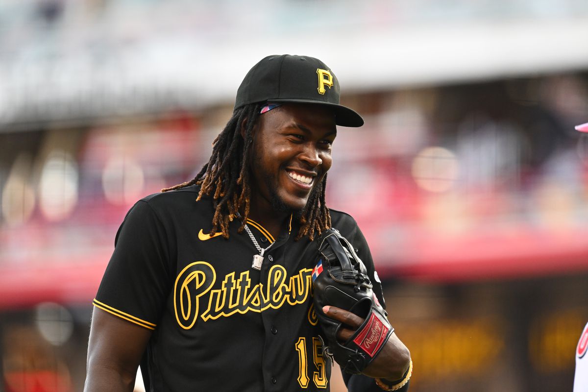 Oneil Cruz of the Pittsburgh Pirates smiles during the game between the Pittsburgh Pirates and the Cincinnati Reds at Great American Ball Park on Thursday, March 30, 2023 in Cincinnati, Ohio.