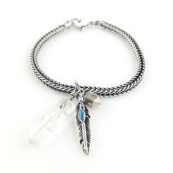 <a href="http://concretepolishjewels.com/bigcartel-items/primitive-charm-bracelet">Primitive Charm Bracelet</a>, $48.75 (reg. $75)