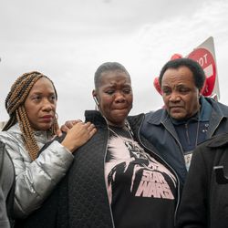Community activist Andrew Holmes comforts Georgetta Carter the day after her granddaughter was shot to death. | Nader Issa/Sun-Times