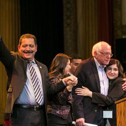 (From left to right) Cook County Commissioner Jesus “Chuy” Garcia, Alma Anaya, candidate for Cook County Commissioner, U.S. Sen. Bernie Sanders and Delia Ramirez, candidate for Illinois sate representative, wave to the crowd after Sanders headlined a campaign rally for Garcia, who is running for Illinois’ 4th Congressional District, at Apollos 2000, 2875 W. Cermak Rd., Wednesday afternoon, Feb. 22, 2018. | Ashlee Rezin/Sun-Times