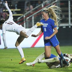 Brigham Young Cougars midfielder Mikayla Colohan gets tangled up with Florida State Seminoles goalie Cristina Roque during the NCAA national soccer championship at Stevens Stadium at Santa Clara University in Santa Clara, Calif. on Monday, Dec. 6, 2021. BYU lost in overtime penalty kicks.