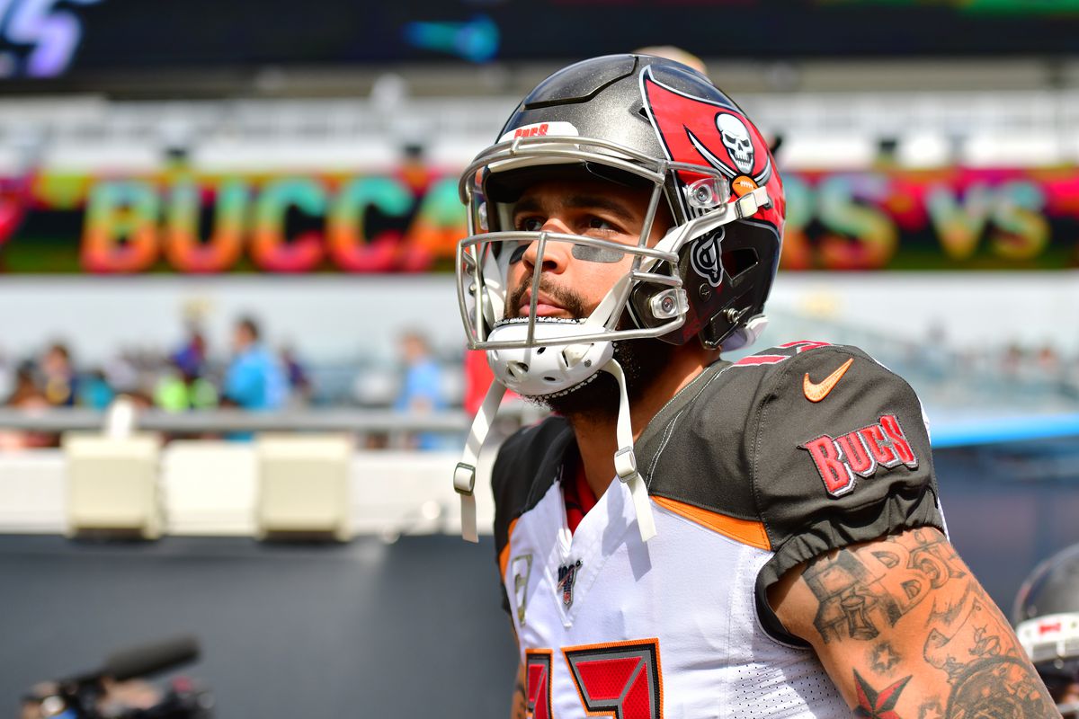 Mike Evans of the Tampa Bay Buccaneers runs out to the field to warm up before a football game against the Jacksonville Jaguars at TIAA Bank Field on December 01, 2019 in Jacksonville, Florida.