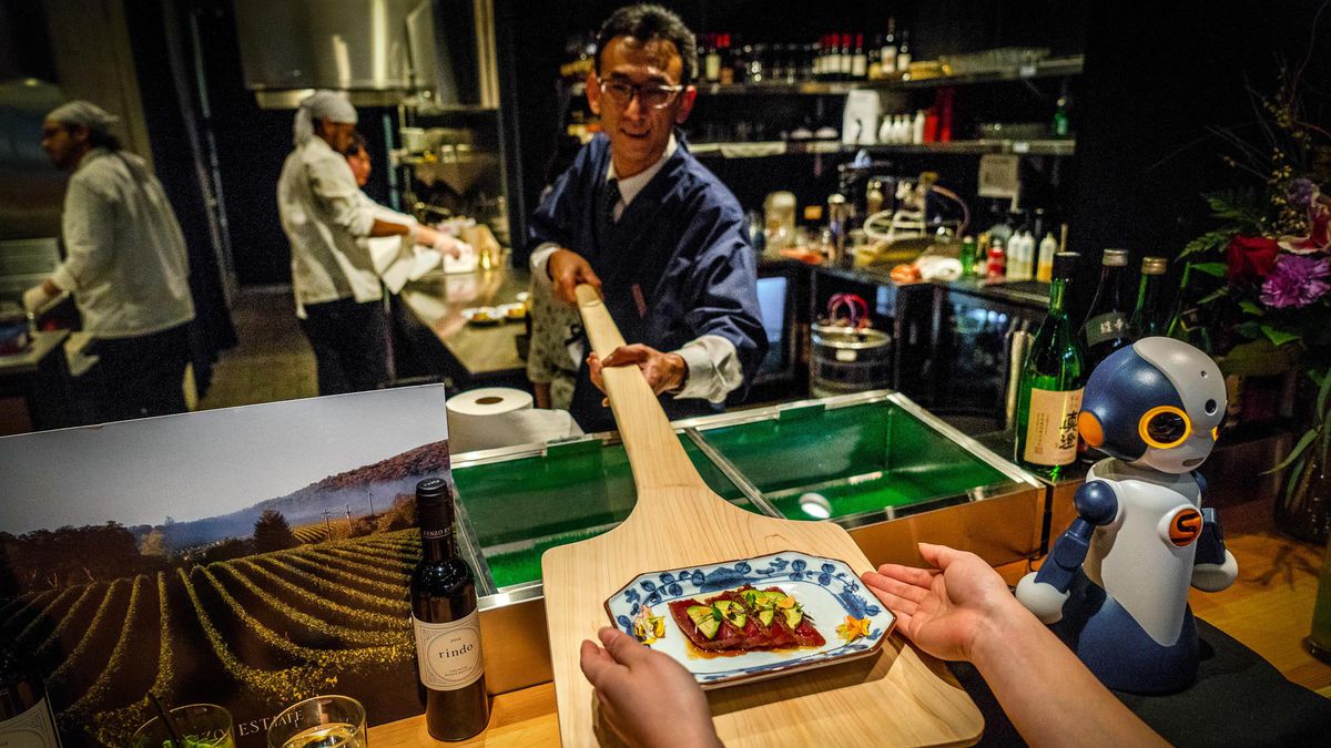 Diners seated at Junkichi’s countertop may get dishes handed to them on a paddle from the chef.
