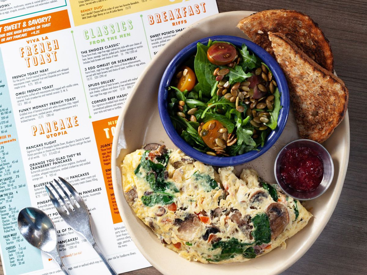 A vegetable omelette with a side salad and wheat toast at Snooze