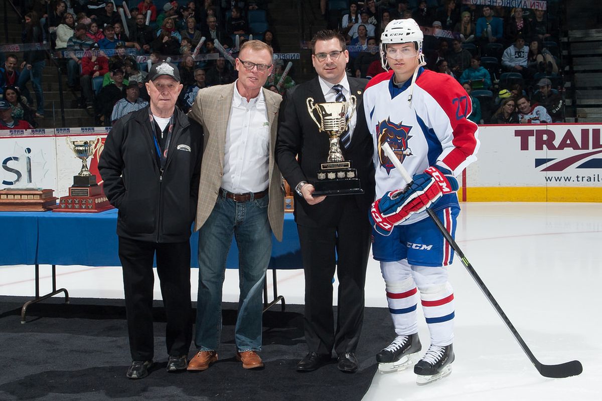 Bulldogs forward Sven Andrighetto is presented with the PMA Top Rookie Award.