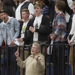 Lee Whitesides of Bountiful, aunt of Highland's Olivia Beckstead, cheers during Highland's 51-41 victory over Woods Cross in the Class 5A state quarterfinals at Salt Lake Community College in Salt Lake City on Wednesday, Feb. 21, 2018.