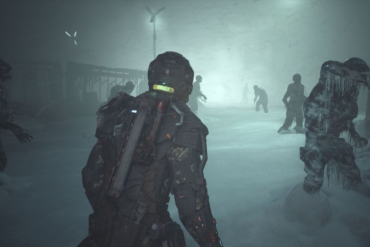 An engineer in a space suit walks through a frozen morass covered in corpses in The Callisto Protocol.