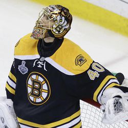 Boston Bruins goalie Tuukka Rask, of Finland, checks the scoreboard after giving up a goal by Chicago Blackhawks center Jonathan Toews during the second period in Game 6 of the NHL hockey Stanley Cup Finals, Monday, June 24, 2013, in Boston. 