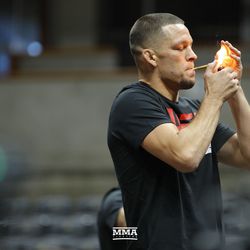 August 14, 2019 — Nate Diaz lights up a joint during the open workouts for UFC 241.