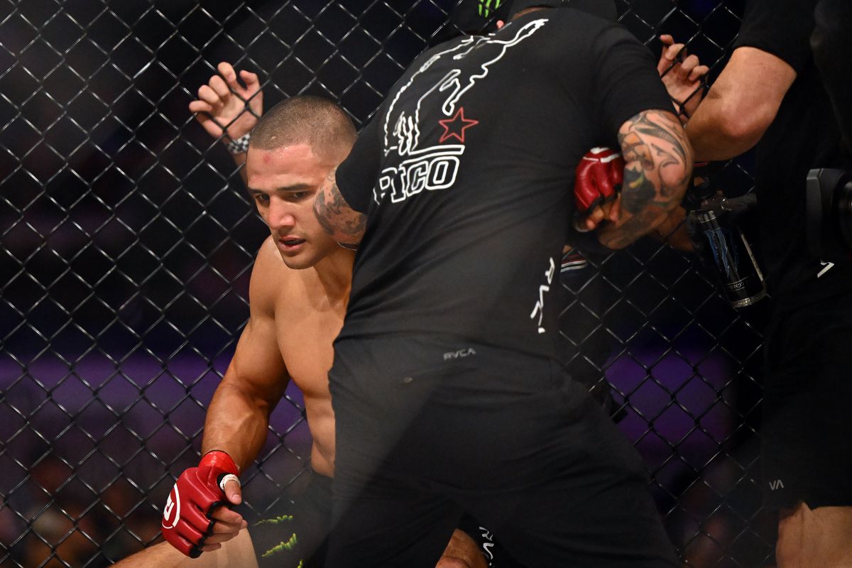 Aaron Pico gets his shoulder worked on by his coach during his Bellator 286 fight against Jeremy Kennedy.