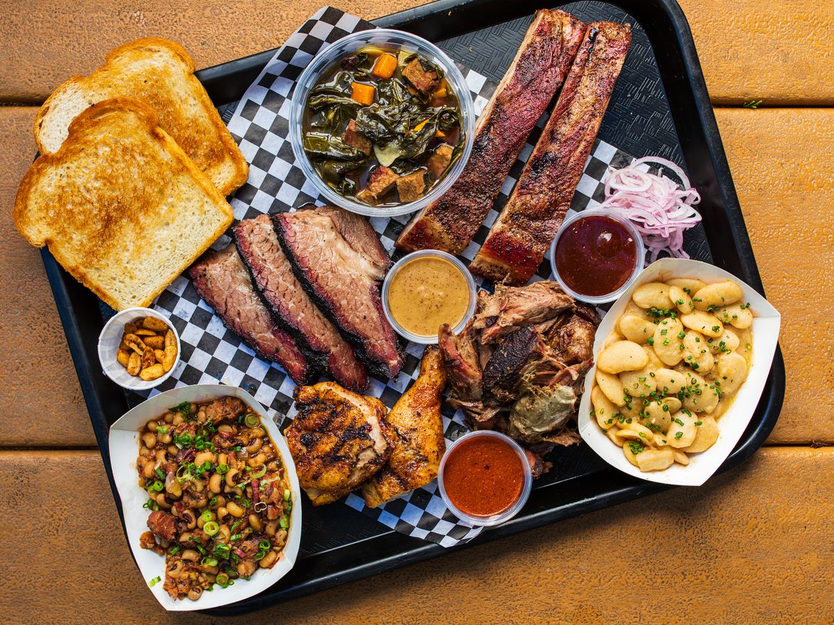 A tray of barbecue and sides.