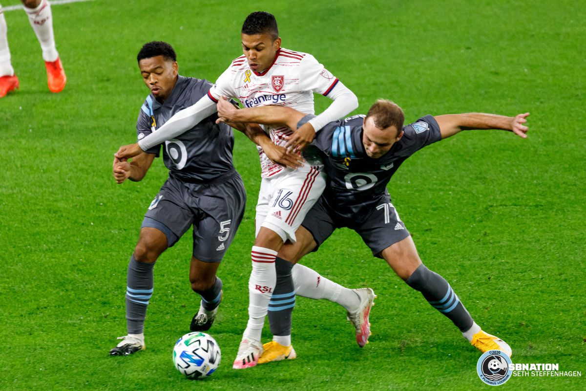 September 27, 2020 - Saint Paul, Minnesota, United States - Minnesota United players Jacori Hayes (5) and Chase Gasper (77) fight Real Salt Lake midfielder Maikel Chang (16) for the ball during the match at Allianz Field. 

(Photo by Seth Steffenhagen/Steffenhagen Photography)