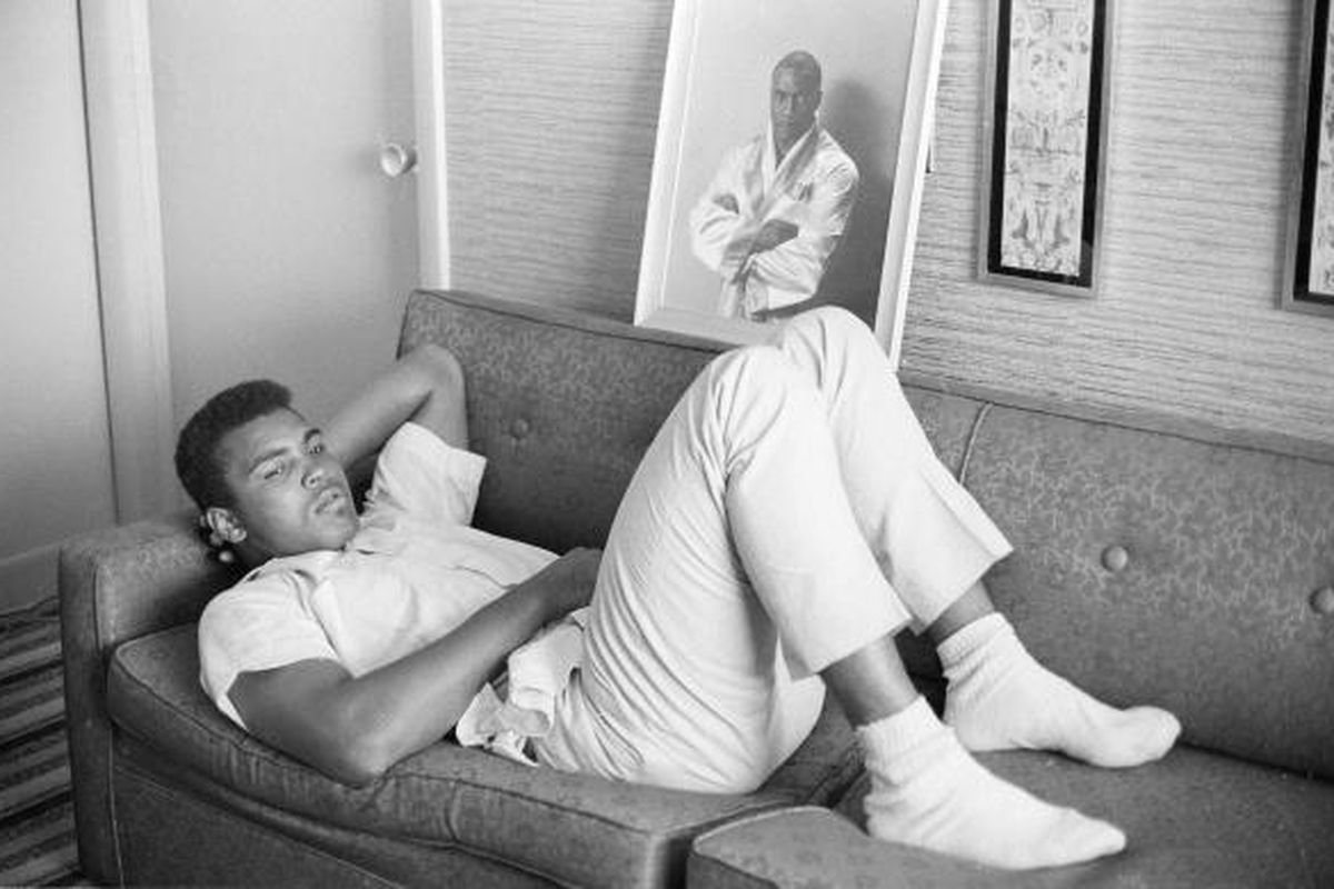 Muhammad Ali rests just before his famous fight against Sonny Liston in 1965.