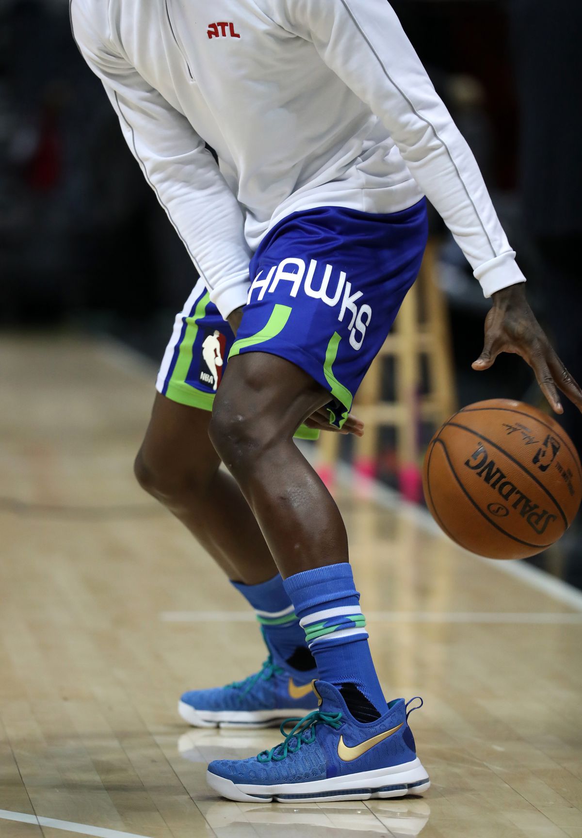 Hawks wore blue and green throwbacks a day before the Seahawks