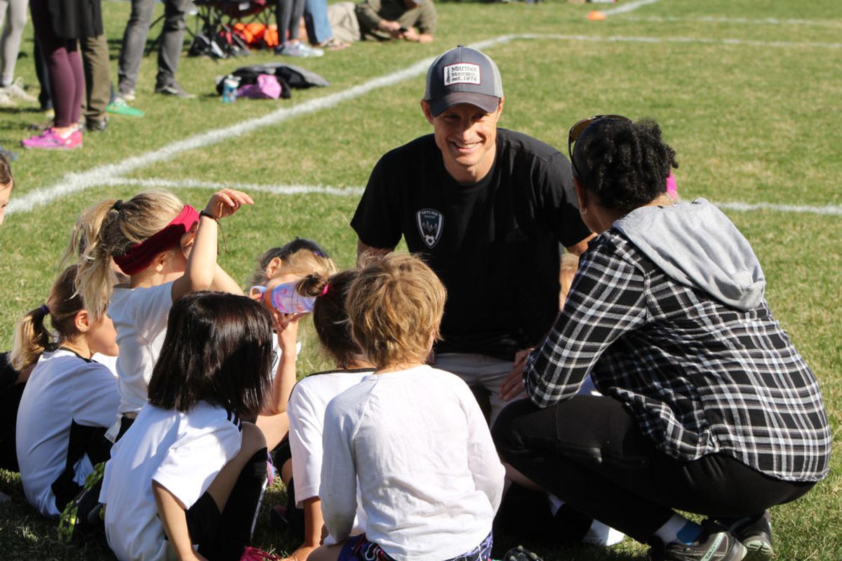 Scott Baldermann coaches his daughter's soccer team.