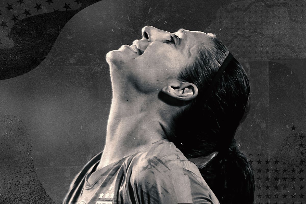 Sepia-toned photo of Carli Lloyd in profile looking up, exasperated.