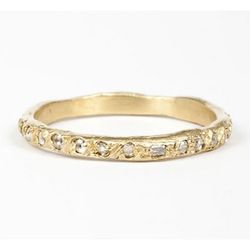 <a href="https://catbirdnyc.com/shop/product.php?productid=18614&cat=297&page=1">Elisa Solomon "Ancienne Diamond Wedding Band,"</a> $1,670 at Catbird