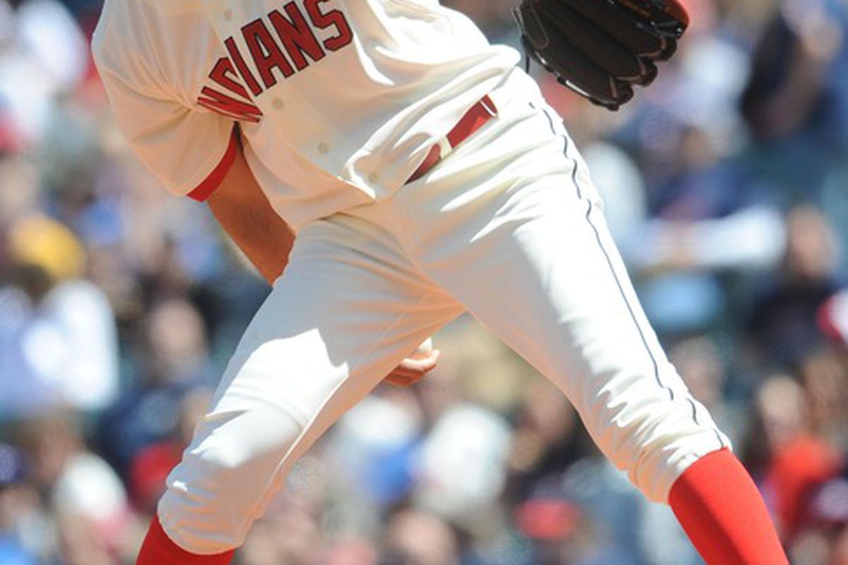 May 6, 2012; Cleveland, OH, USA: Cleveland Indians starting pitcher Ubaldo Jimenez (30) throws a pitch during the first inning against the Texas Rangers at Progressive Field.  Mandatory Credit: Eric P. Mull-USPRESSWIRE