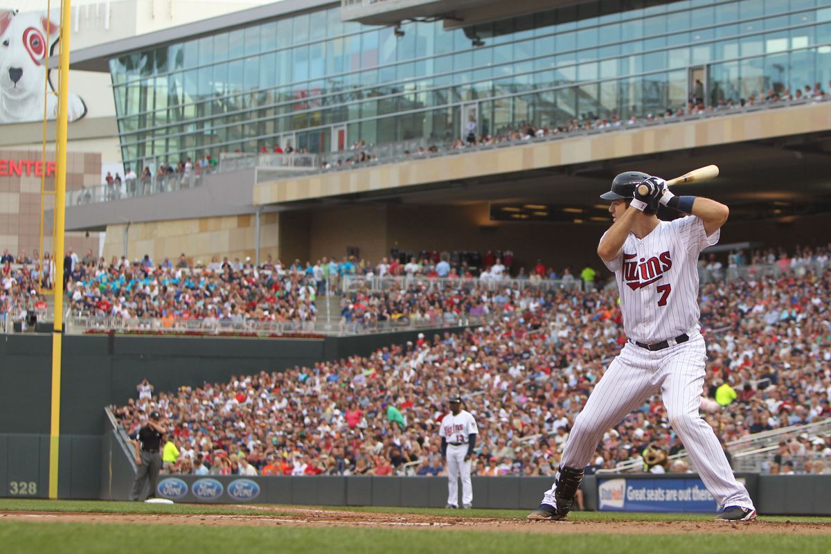 July 28, 2012; Minneapolis, MN, USA; Minnesota Twins catcher Joe Mauer (7) against the Cleveland Indians at Target Field. The Twins defeated the Indians 12-5. Mandatory Credit: Brace Hemmelgarn-US PRESSWIRE