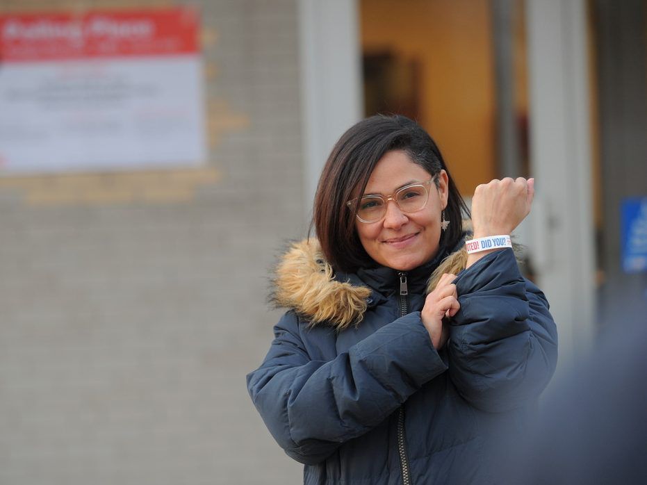 33rd Ward aldermanic  candidate Rossana Rodriguez-Sanchez shows her “I voted” sticker outside of polling station at the American Indian Center, located in Chicago’s Kimball neighborhood on Election Day, April 2, 2019.| Victor Hilitski/For the Sun-Times