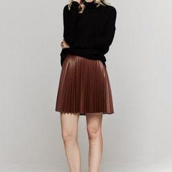 <a href="http://www.thedreslyn.com/lover-divinyl-mini-skirt.html">Lovor divinyl mini-skirt</a>, $224 (was $400) 