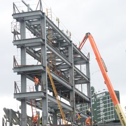 2:36 p.m. Another view of work on the right-field video board structure - 