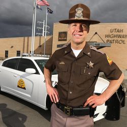 Col. Dan Fuhr of the Utah Highway Patrol poses for photos at the Murray offices Tuesday, Feb. 10, 2015, prior to going out on the freeway.
