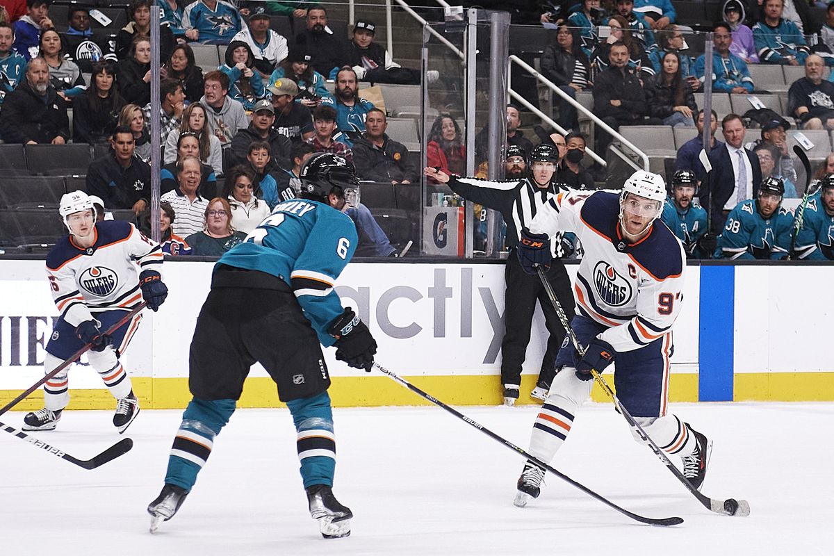 Edmonton Oilers center Connor McDavid (97) takes a shot during the NHL game between the San Jose Sharks and the Edmonton Oilers on April 5, 2022 at SAP Center in San Jose, CA.