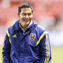 Real Salt Lake coach Jeff Cassar smiles during the game Sacramento Republic FC  in Sandy  Tuesday, Sept. 30, 2014.  Real won 2-0.
