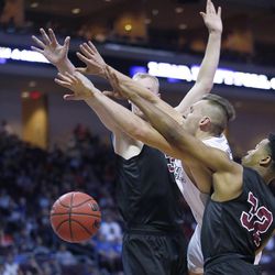 Brigham Young Cougars guard Kyle Collinsworth (5) is fouled by Santa Clara Broncos forward Henrik Jadersten (3) during the WCC tournament in Las Vegas Saturday, March 5, 2016. BYU won 72-60. 