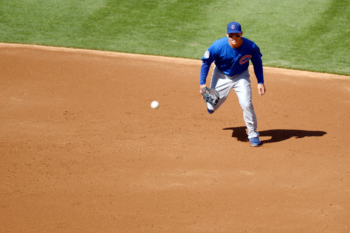 San Diego, CA, USA; Chicago Cubs first baseman Anthony Rizzo fields a grounder off the bat of San Diego Padres left fielder Mark Kotsay at Petco Park. Credit: Jake Roth-US PRESSWIRE
