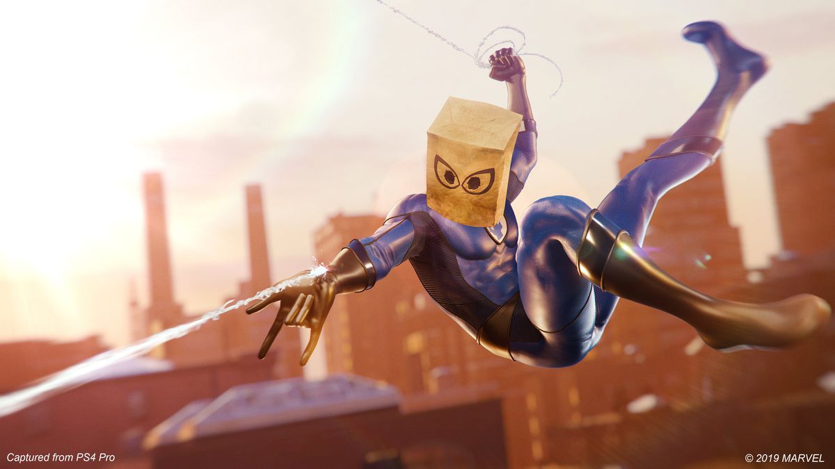 Spider-Man swings over New York in his Bombastic Bag-Man costume in a screenshot from Marvelâs Spider-Man.