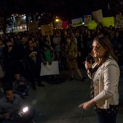 Misty Snow, the Democratic candidate defeated by Sen. Mike Lee, R-Utah, speaks to people gathered at Washington Square in Salt Lake City to stand in opposition to President-elect Donald Trump on Wednesday, Nov. 9, 2016.