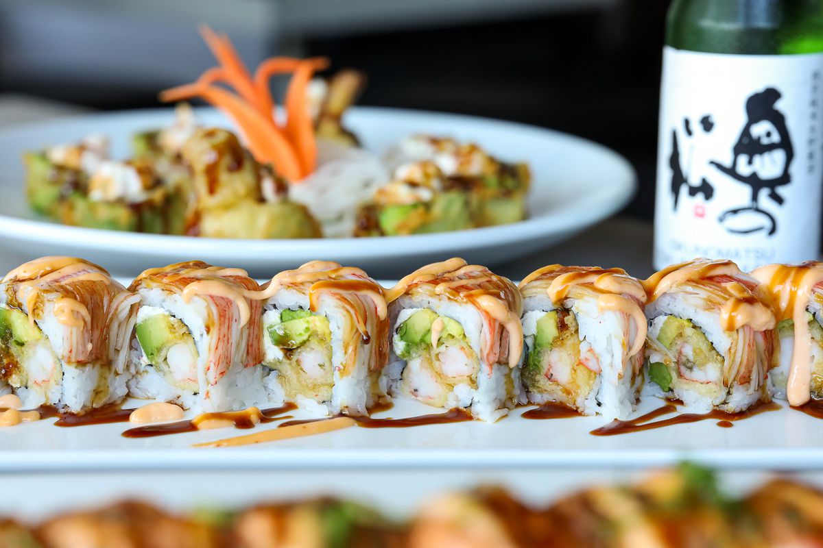 Red Raider Roll at Sushi Mocki combines spicy tuna, avocado, salmon and tuna, all topped with ginger dressing. 